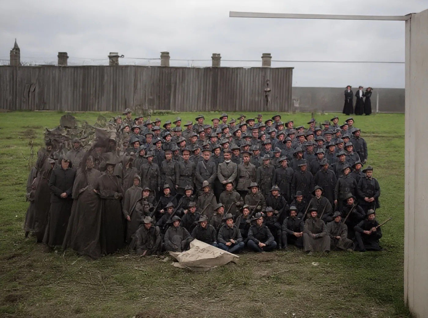 The same photograph with the lost areas filled by figures that were never there